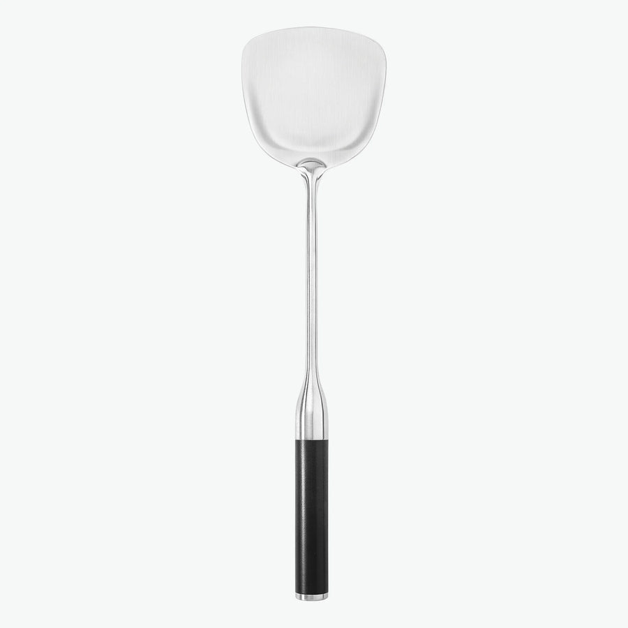 Stekspade i rostfritt stål med handtag i G-10, sedd framifrån