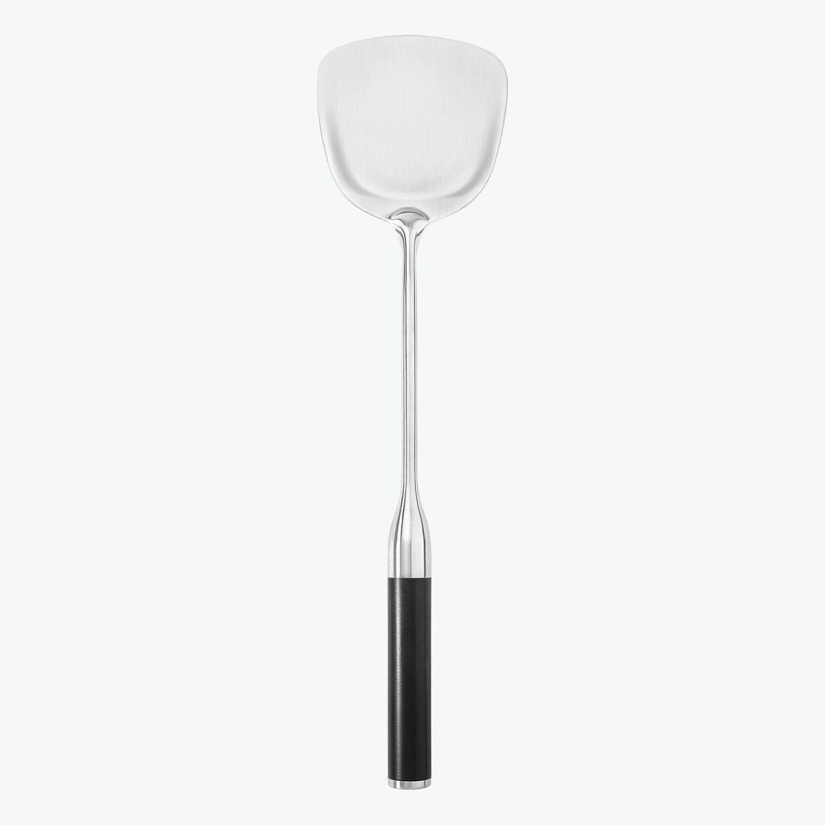Stekspade i rostfritt stål med handtag i G-10, sedd framifrån