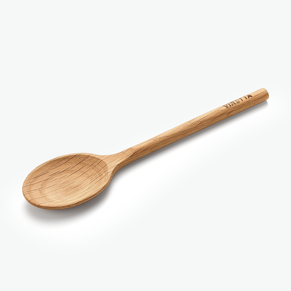 Liten träsked i ek, sedd snett