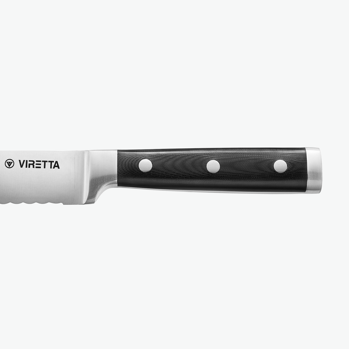 Skaft i G-10 med tre nitar på Classic brödkniv, sett från sidan