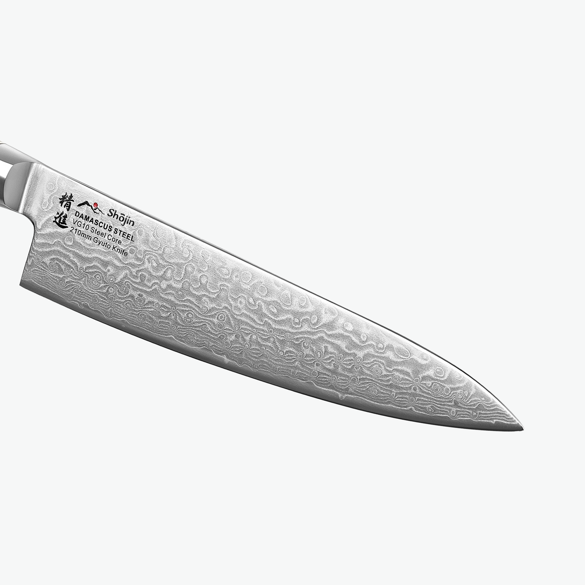 Damaskusmönster på bladet på Shōjin Kaku gyuto, i närbild