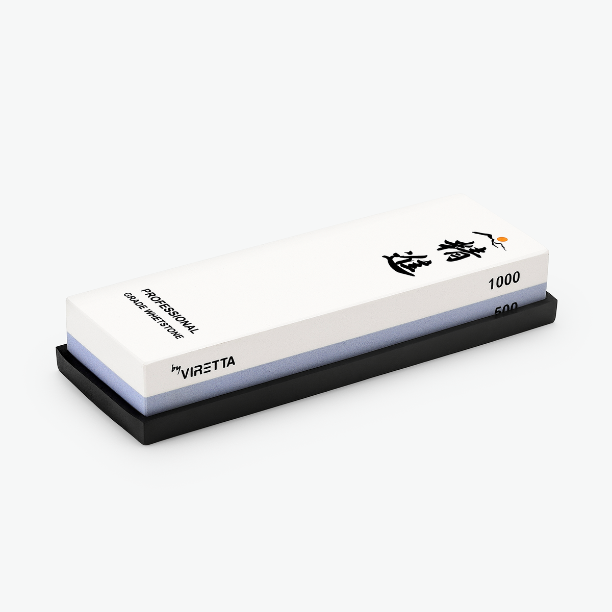 Shōjin slipsten 500/1000 ur setet, på gummibotten, sedd snett